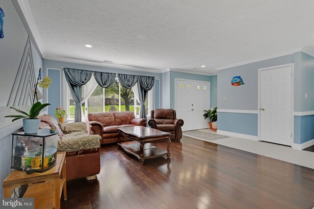 3600 Yorktown Dr, Waldorf, MD 20601 - living area featuring a textured ceiling, wood finished floors, ornamental molding, and recessed lighting