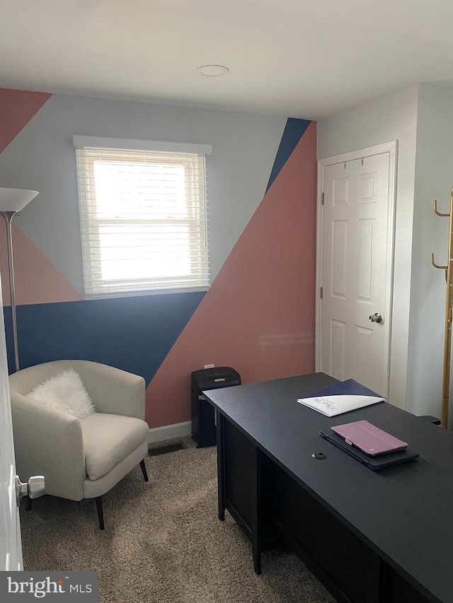 view of carpeted office space