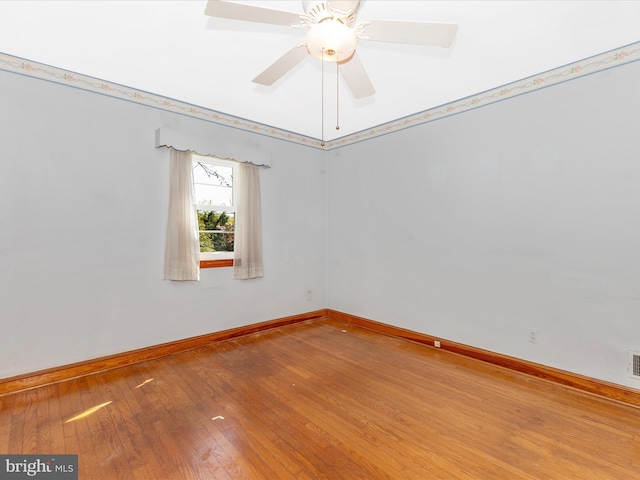 268 Magothy Bridge Rd, Pasadena, MD 21122 - spare room featuring wood-type flooring, a ceiling fan, baseboards, and visible vents