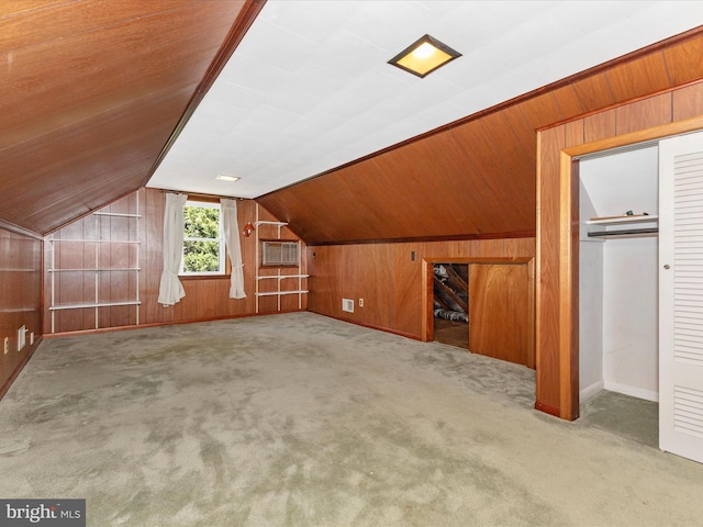 268 Magothy Bridge Rd, Pasadena, MD 21122 - additional living space with carpet floors, baseboards, wood walls, and lofted ceiling