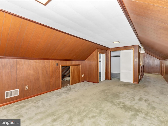 268 Magothy Bridge Rd, Pasadena, MD 21122 - bonus room with wood walls, visible vents, a wall unit AC, and lofted ceiling