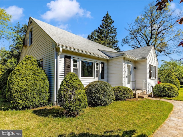 268 Magothy Bridge Rd, Pasadena, MD 21122 - view of front of house with a front lawn and roof with shingles