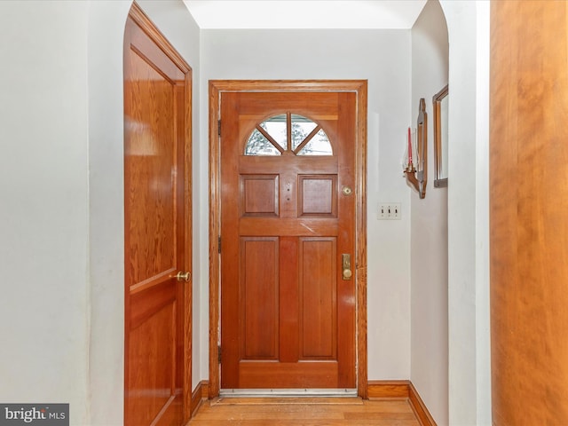 268 Magothy Bridge Rd, Pasadena, MD 21122 - doorway featuring baseboards and light wood-style flooring