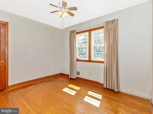 268 Magothy Bridge Rd, Pasadena, MD 21122 - unfurnished room featuring light wood-type flooring, a ceiling fan, baseboards, and visible vents