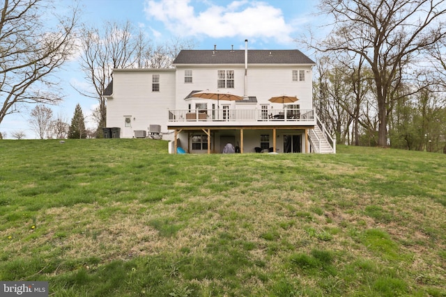 back of house with stairs, a wooden deck, a yard, and central air condition unit