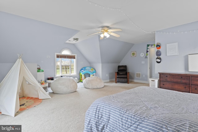 bedroom with vaulted ceiling, carpet floors, ceiling fan, and baseboards
