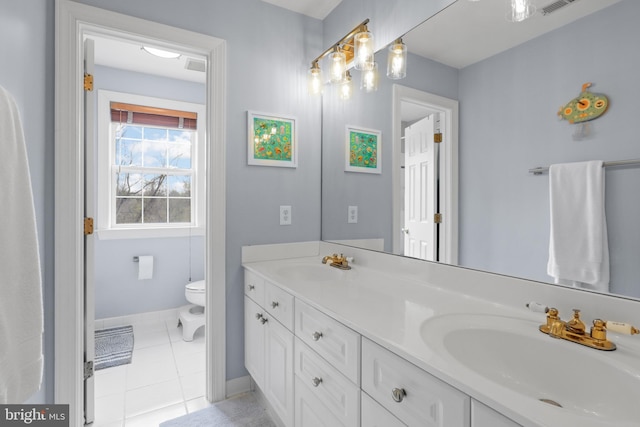 full bathroom with tile patterned floors, toilet, double vanity, and baseboards