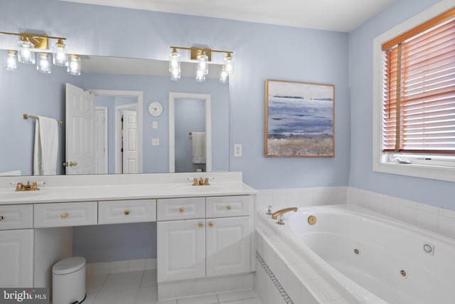 full bathroom featuring a jetted tub, plenty of natural light, double vanity, and tile patterned flooring