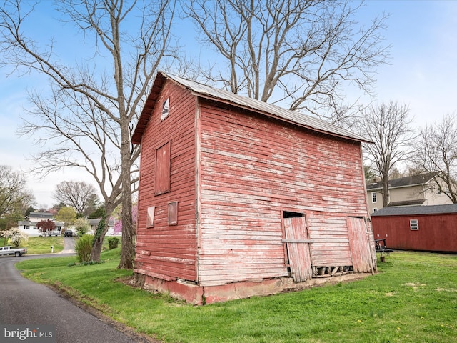 view of outbuilding with an outbuilding