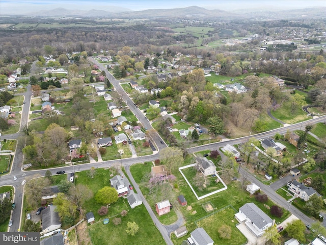 birds eye view of property with a residential view
