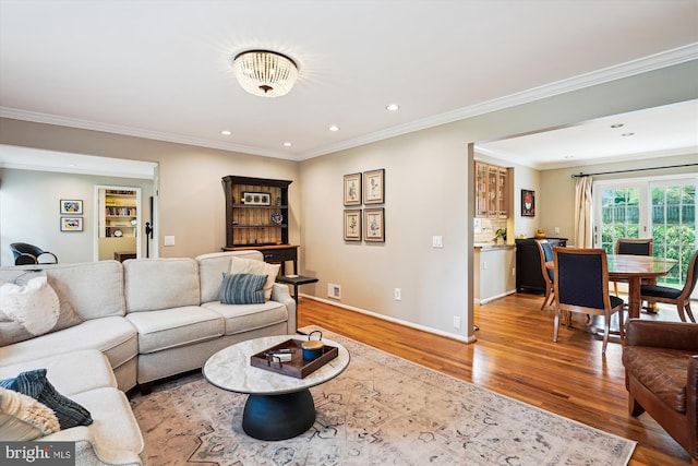 9000 Hunting Horn Ln, Potomac, MD 20854 - living room featuring light wood-style flooring, ornamental molding, recessed lighting, and baseboards