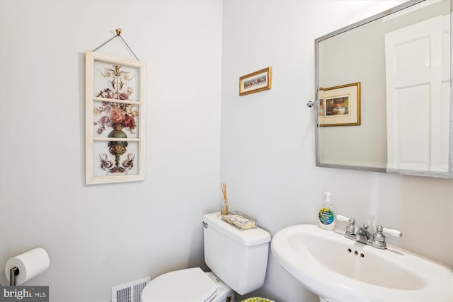 9000 Hunting Horn Ln, Potomac, MD 20854 - half bathroom with toilet and a sink