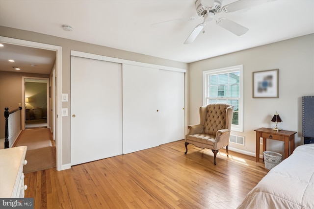 9000 Hunting Horn Ln, Potomac, MD 20854 - bedroom with light wood finished floors, a closet, ceiling fan, and baseboards