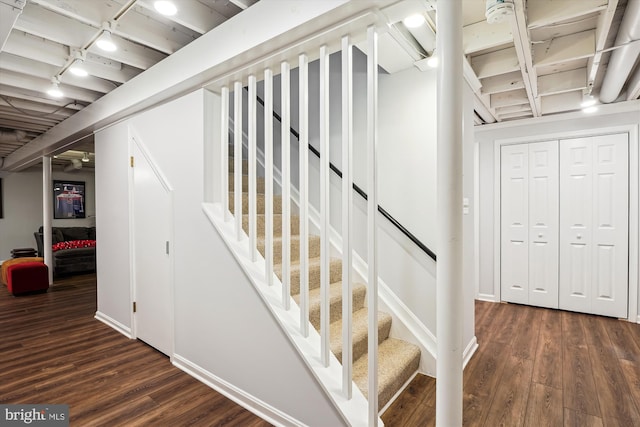 9000 Hunting Horn Ln, Potomac, MD 20854 - stairway with track lighting, wood finished floors, and baseboards