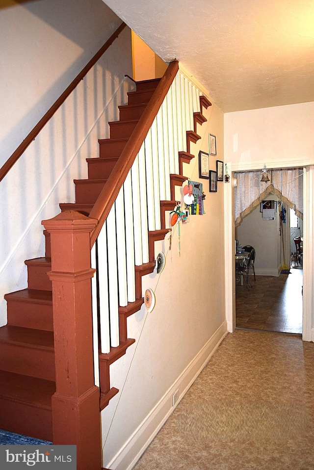 140 Baltimore St, Hanover, PA 17331 - staircase with baseboards