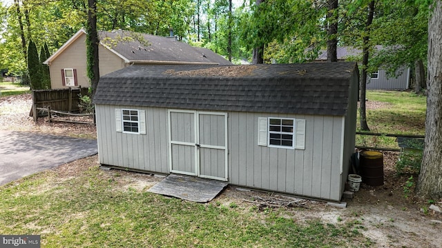 419 Kimberly Way, Felton, DE 19943 - view of shed featuring fence and view of scattered trees