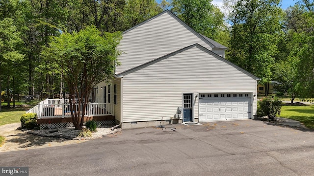 419 Kimberly Way, Felton, DE 19943 - view of side of property featuring driveway, crawl space, a deck, and view of scattered trees
