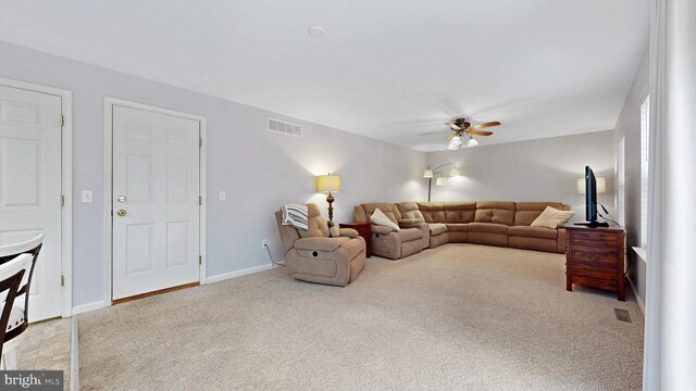 419 Kimberly Way, Felton, DE 19943 - carpeted living area with ceiling fan and baseboards