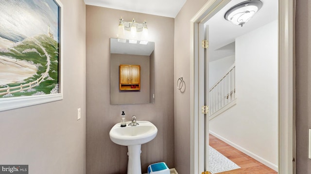 419 Kimberly Way, Felton, DE 19943 - bathroom with wood finished floors, baseboards, and a sink