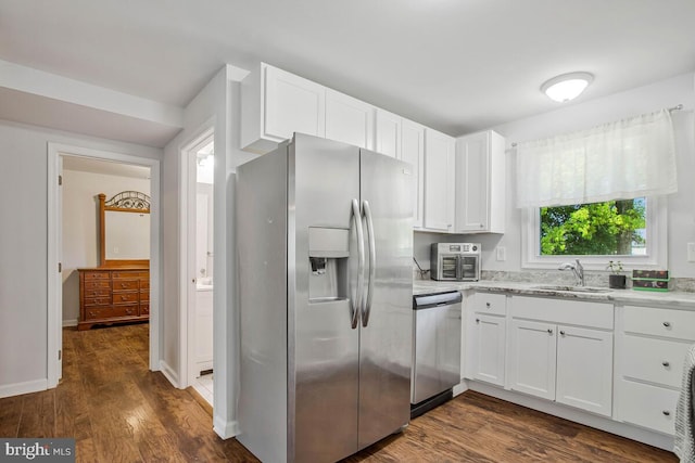 1012 Twin Vw, Glen Burnie, MD 21060 - kitchen with light stone countertops, a sink, dark wood finished floors, stainless steel appliances, and white cabinetry