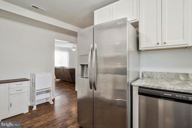 1012 Twin Vw, Glen Burnie, MD 21060 - kitchen with white cabinets, stainless steel appliances, dark wood-type flooring, and visible vents