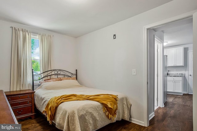 1012 Twin Vw, Glen Burnie, MD 21060 - bedroom with dark wood-style flooring and baseboards