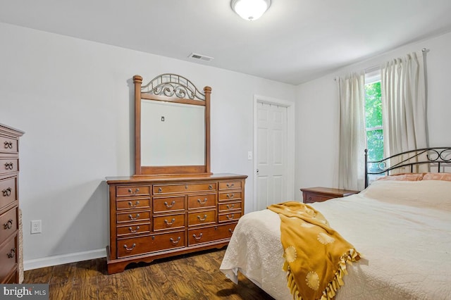 1012 Twin Vw, Glen Burnie, MD 21060 - bedroom featuring dark wood-style flooring, baseboards, and visible vents