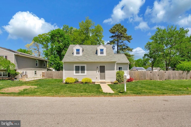 1012 Twin Vw, Glen Burnie, MD 21060 - view of front facade with a front lawn and fence
