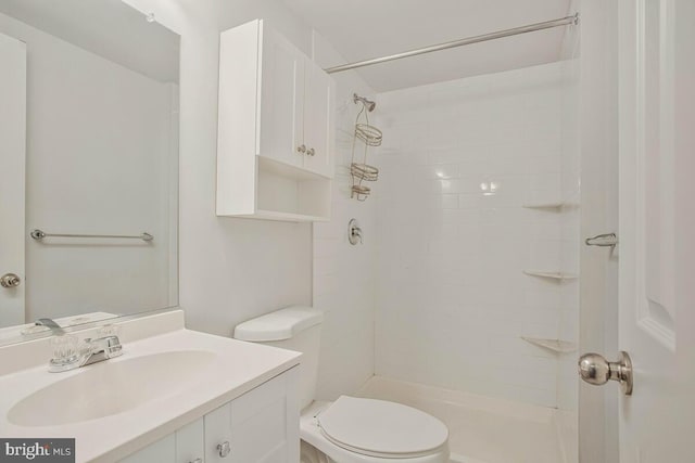 1012 Twin Vw, Glen Burnie, MD 21060 - bathroom with toilet, tiled shower, and vanity