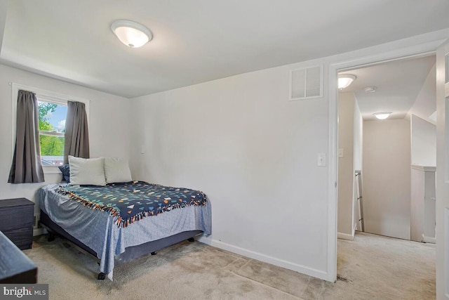 1012 Twin Vw, Glen Burnie, MD 21060 - bedroom with baseboards, light carpet, and visible vents