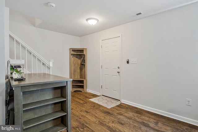 1012 Twin Vw, Glen Burnie, MD 21060 - entrance foyer featuring baseboards, visible vents, stairway, and dark wood-type flooring