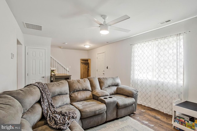 1012 Twin Vw, Glen Burnie, MD 21060 - living room featuring ceiling fan, visible vents, wood finished floors, and stairway