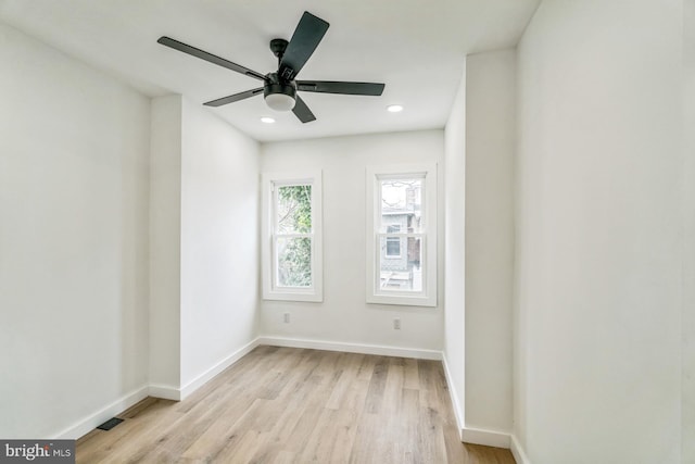 unfurnished room featuring recessed lighting, light wood-type flooring, baseboards, and ceiling fan