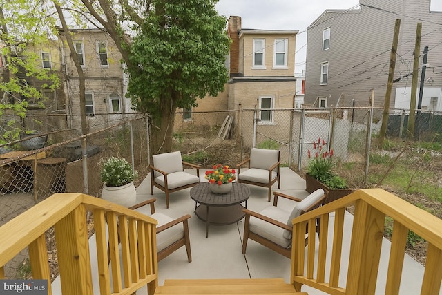 balcony featuring outdoor lounge area and a patio area