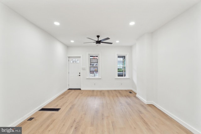 interior space with recessed lighting, light wood-style flooring, baseboards, and ceiling fan
