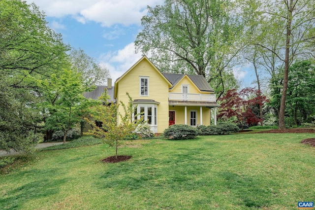 1112 Park St, Charlottesville, VA 22901 - view of front of home with a balcony and a front yard