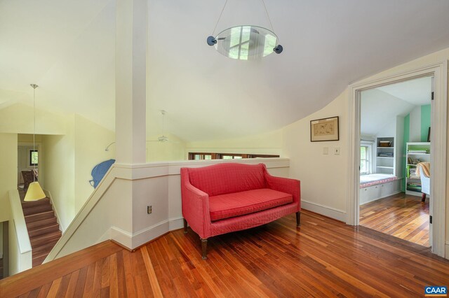 1112 Park St, Charlottesville, VA 22901 - living area featuring baseboards, lofted ceiling, hardwood / wood-style flooring, and an upstairs landing