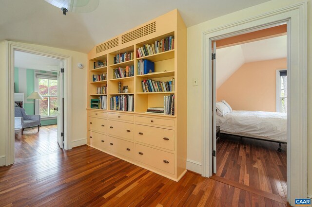 1112 Park St, Charlottesville, VA 22901 - corridor with lofted ceiling, baseboards, and dark wood-style flooring
