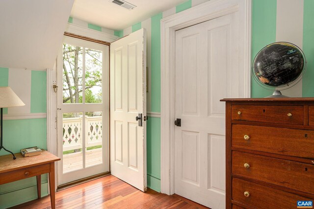 1112 Park St, Charlottesville, VA 22901 - entryway with a baseboard radiator, light wood-style floors, and visible vents