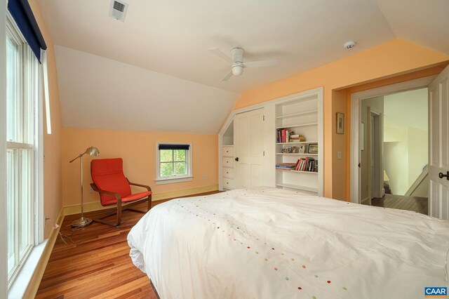 1112 Park St, Charlottesville, VA 22901 - bedroom with light wood finished floors, vaulted ceiling, visible vents, a closet, and baseboards