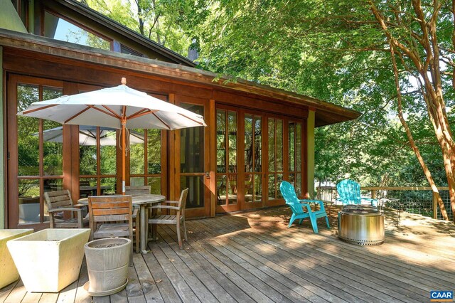 1112 Park St, Charlottesville, VA 22901 - deck with outdoor dining area and french doors