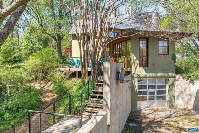 1112 Park St, Charlottesville, VA 22901 - view of home's exterior featuring stucco siding and stairs