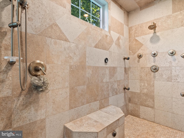 bathroom featuring tiled shower