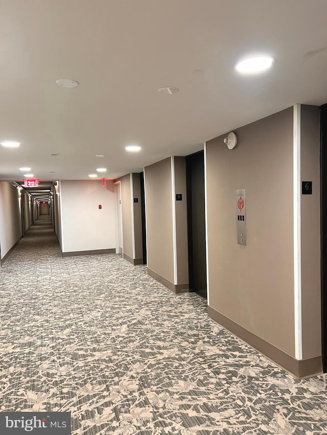 2300 Pimmit Dr Unit 601, Falls Church, VA 22043 - hall with baseboards, carpet floors, and recessed lighting