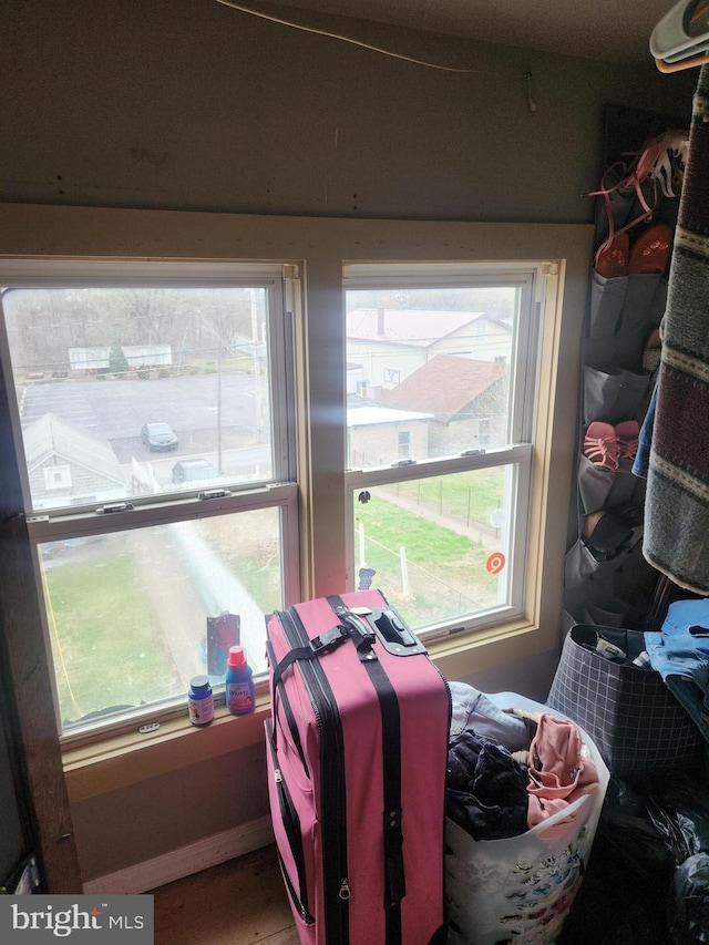 bedroom featuring multiple windows