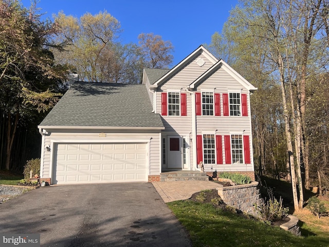 9409 Emory Grove Rd, Gaithersburg, MD 20877 - view of front of home featuring asphalt driveway, a garage, and a shingled roof