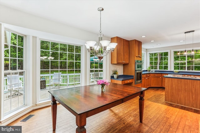 9409 Emory Grove Rd, Gaithersburg, MD 20877 - dining room featuring a chandelier, plenty of natural light, light wood-style floors, and recessed lighting