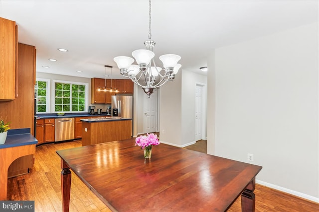 9409 Emory Grove Rd, Gaithersburg, MD 20877 - dining area with a chandelier, light wood-style floors, recessed lighting, and baseboards