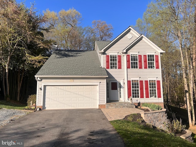 9409 Emory Grove Rd, Gaithersburg, MD 20877 - view of front of home featuring driveway, an attached garage, and roof with shingles