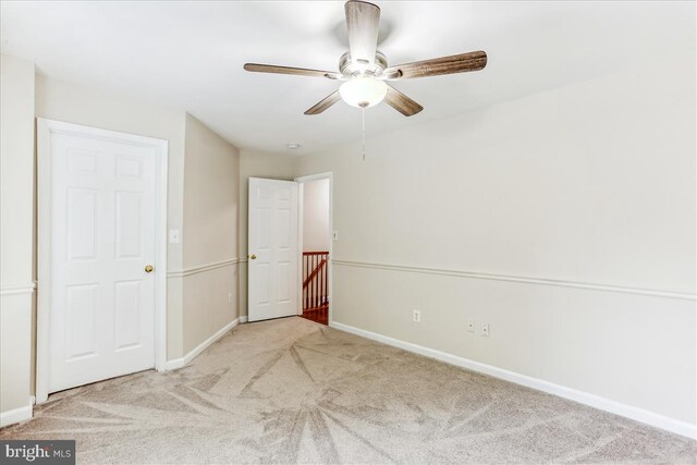 9409 Emory Grove Rd, Gaithersburg, MD 20877 - unfurnished bedroom featuring carpet, baseboards, and ceiling fan